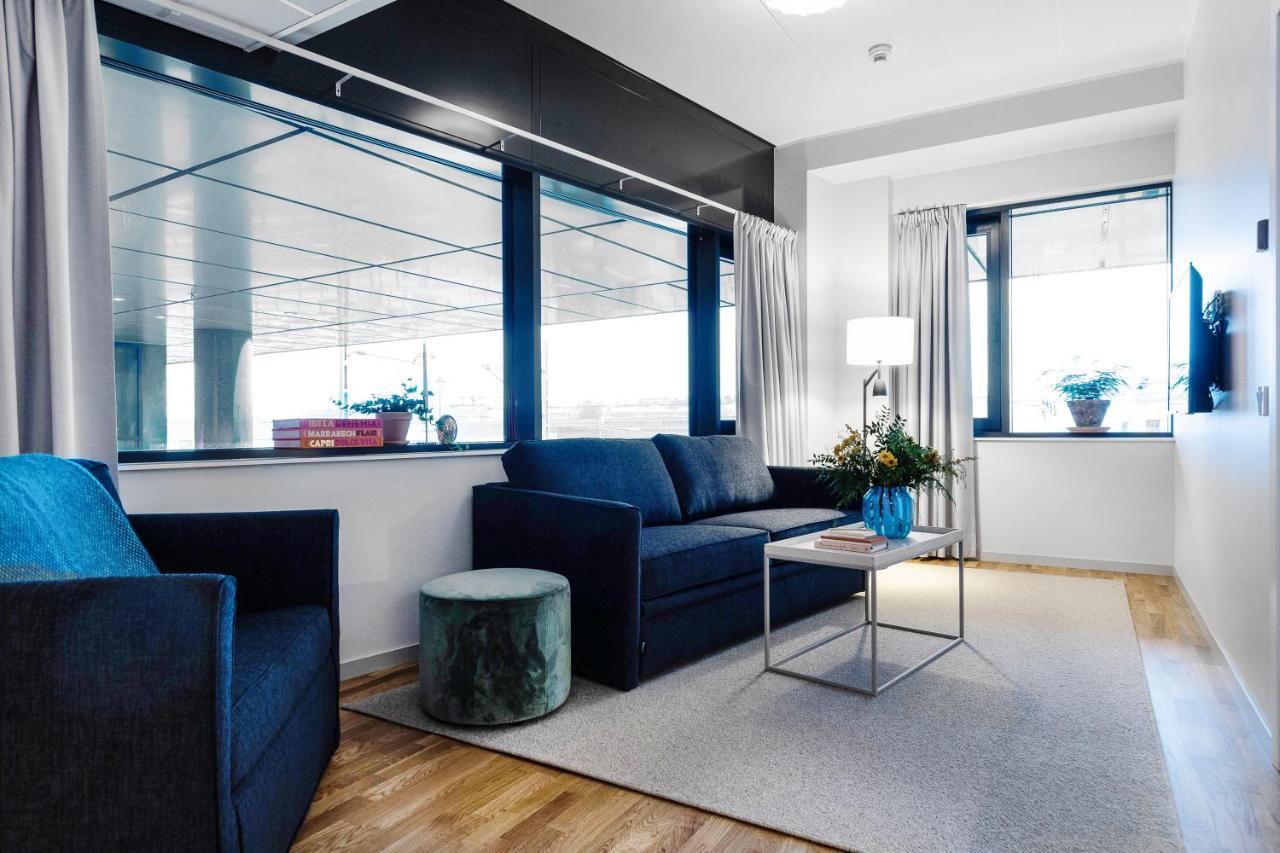 Biz Apartment Bromma 스톡홀름 외부 사진 A living room in a serviced apartment